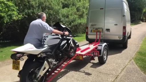 Mark loading onto trailer