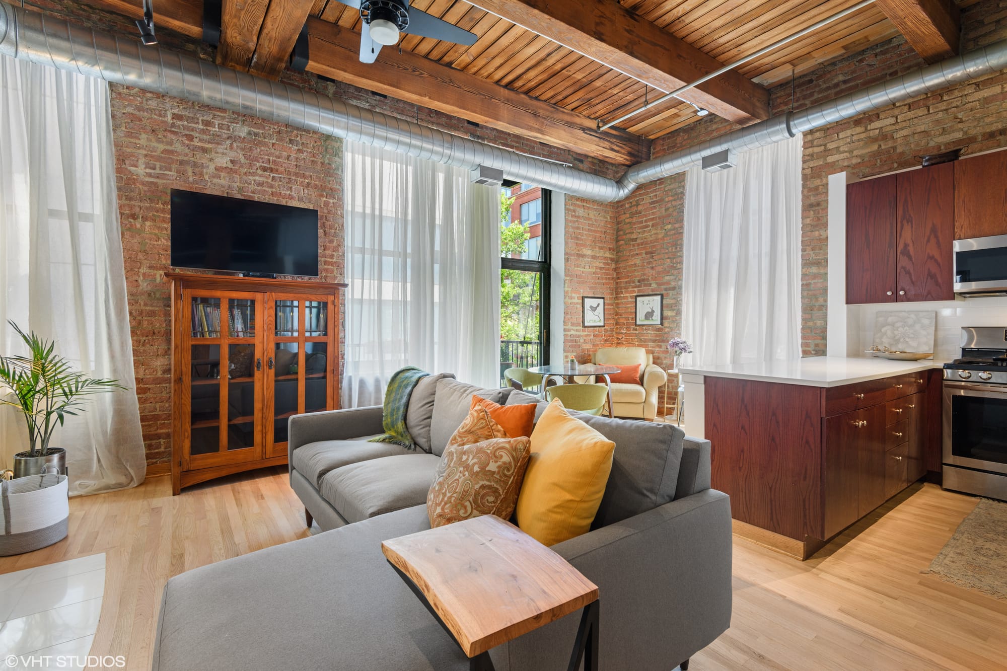 After - this space now has a dining option as well as color infused throughout!