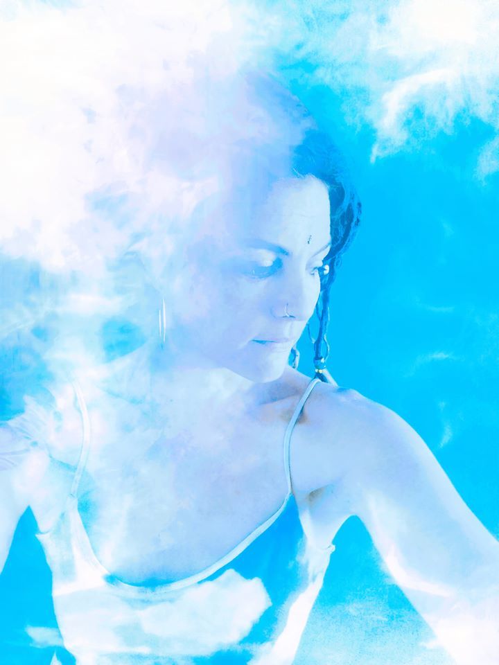 Untitled - Josie Seydel - Still playing with photography. Blended photos of sky, smoke and self portrait