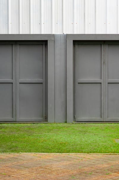 THE PROS AND CONS OF INSULATED GARAGE DOORS