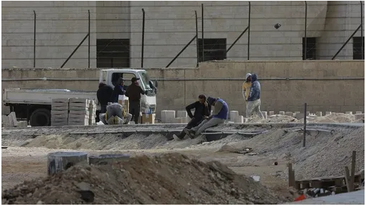 Laborers face tough conditions working outdoors in heat, cold