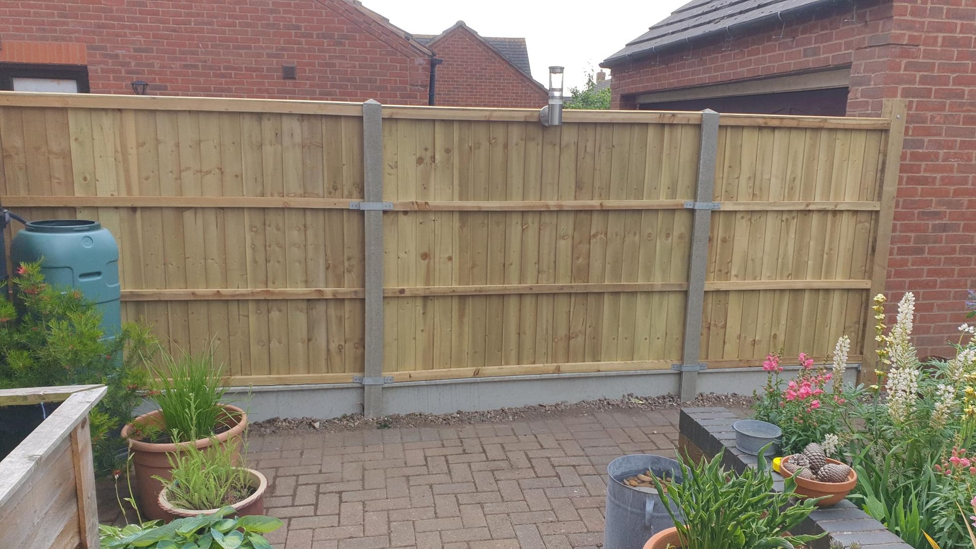 5' Featheredge Standard Panels with Concrete Posts and Gravel Boards