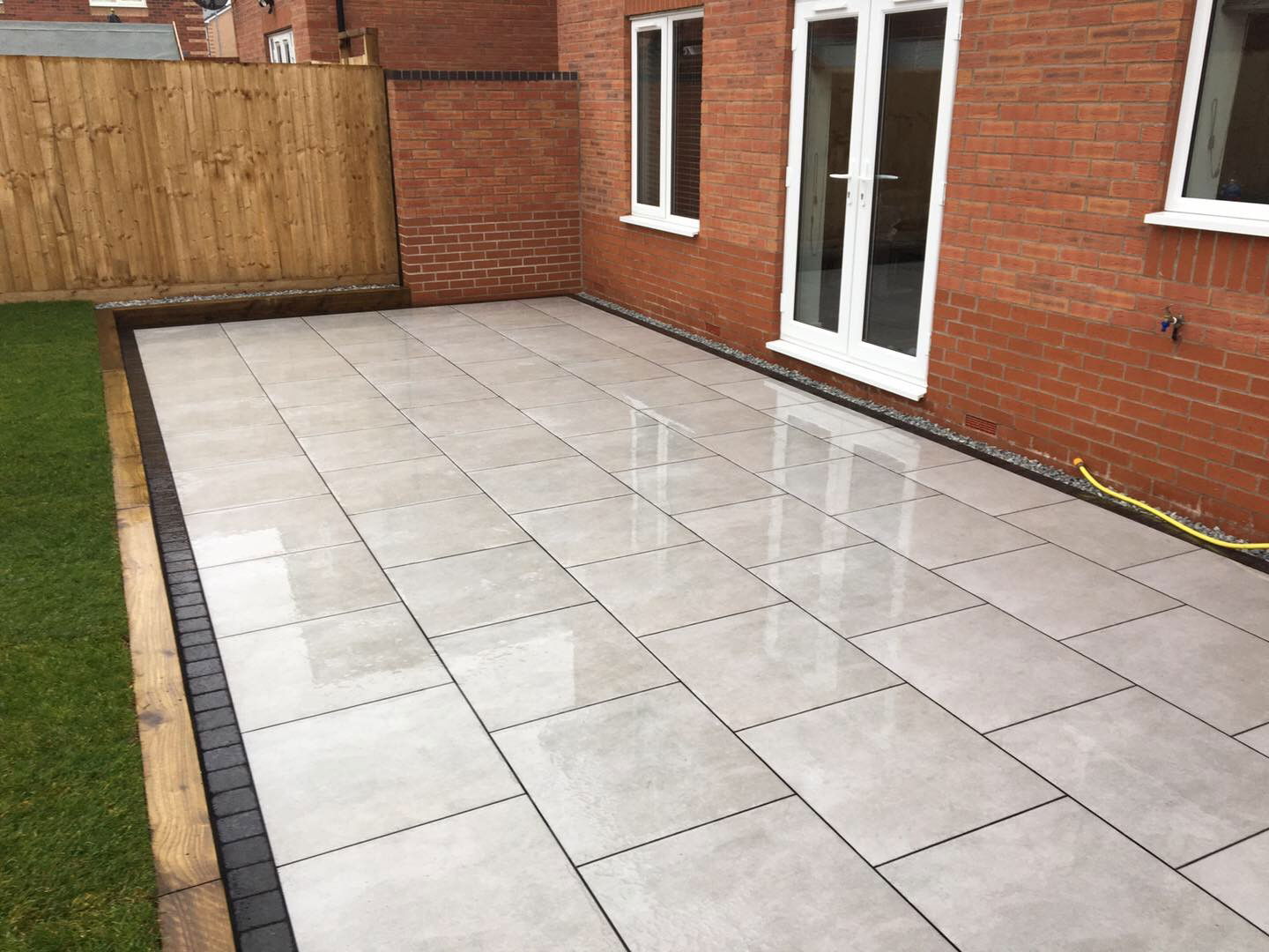 Newstone Grey Porcelain - Lazura - edged with Impala Black Setts - Digby Stone