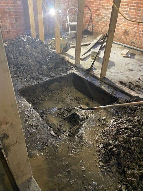 Basement view - preparing space for basement structural beams