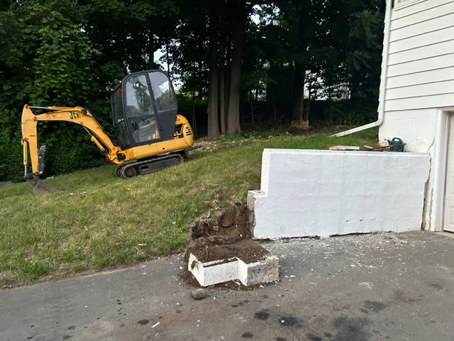 Marius St. retaining wall demo & replacement. 
