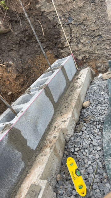 Marius St. retaining wall demo & replacement. 