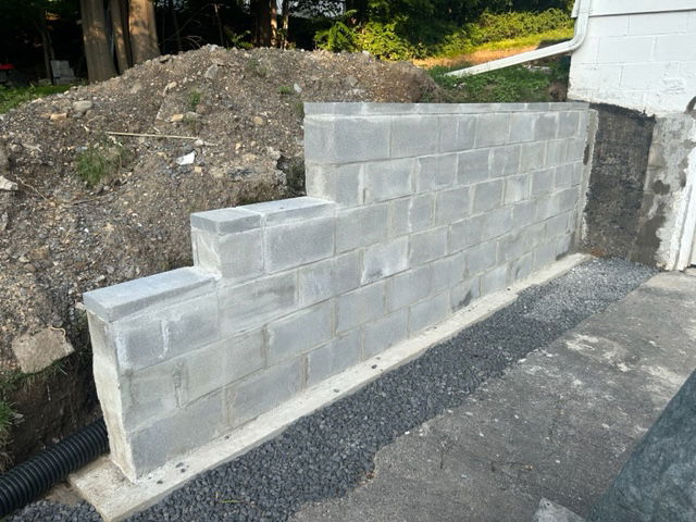 Marius St. retaining wall demo & replacement. 