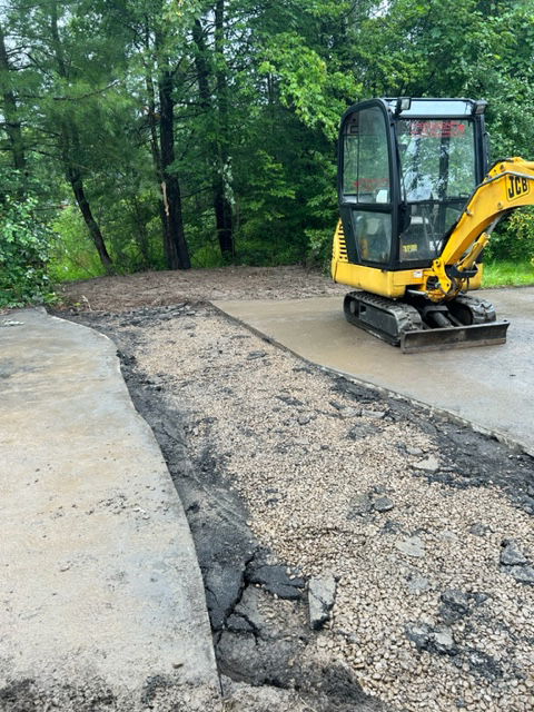 Woodstock Chimes driveway culvert pipe replacement. 