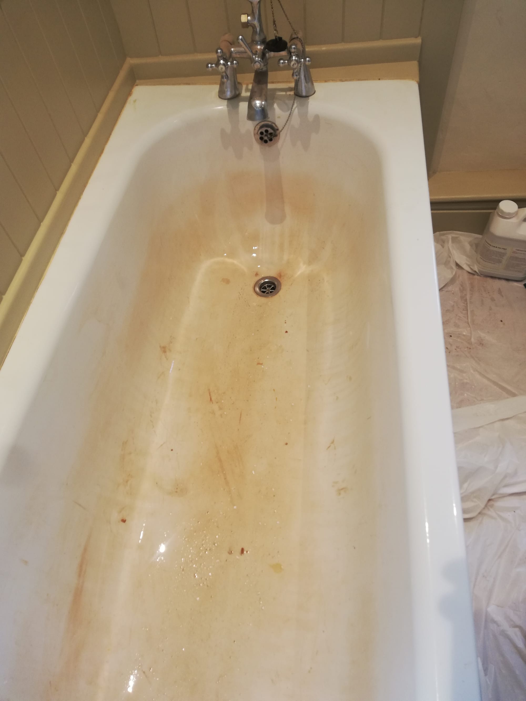 Badly Stained cast iron bath