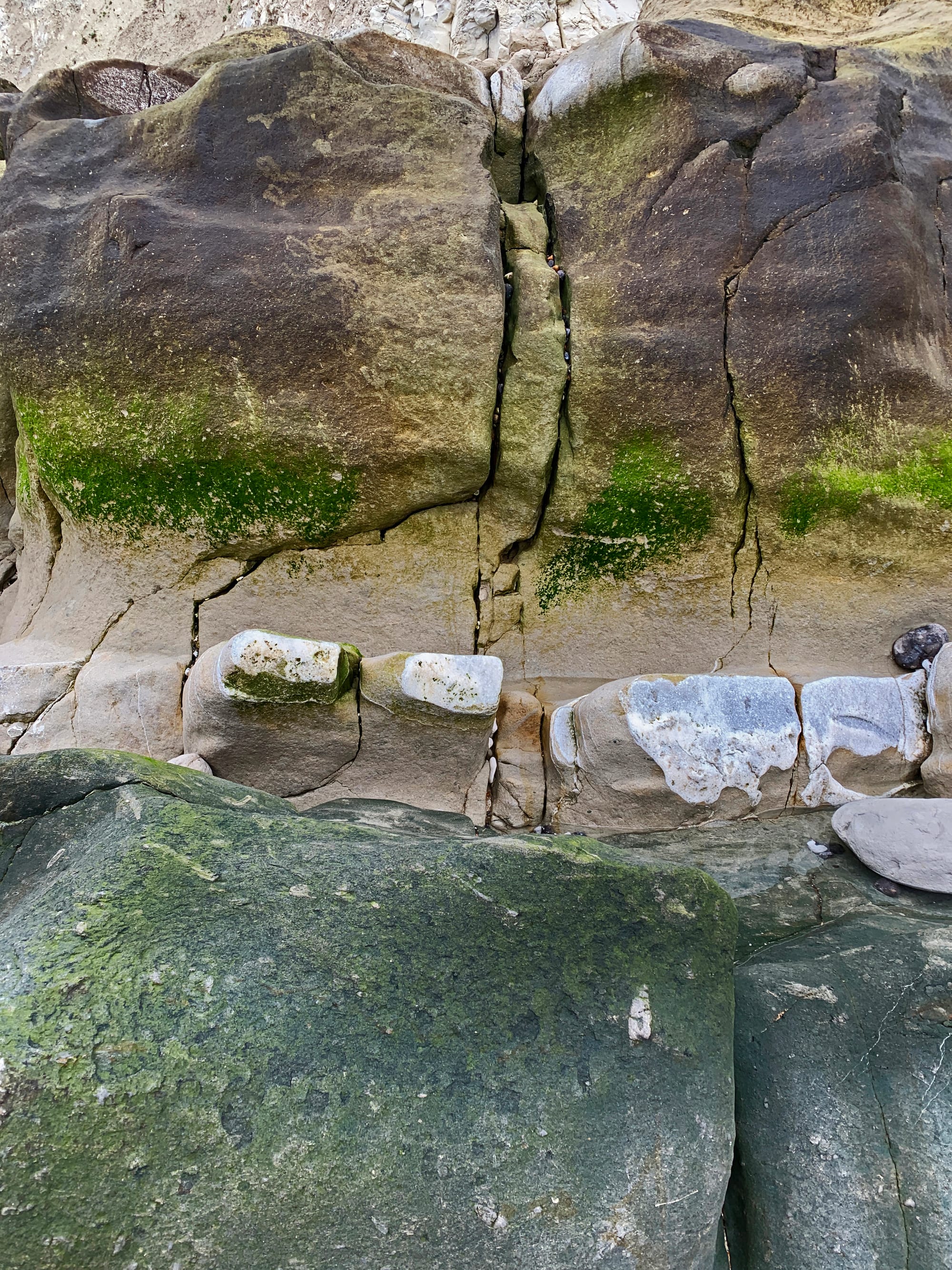 Worn Dentures in the Cliff Face, Cow Gap, East Sussex