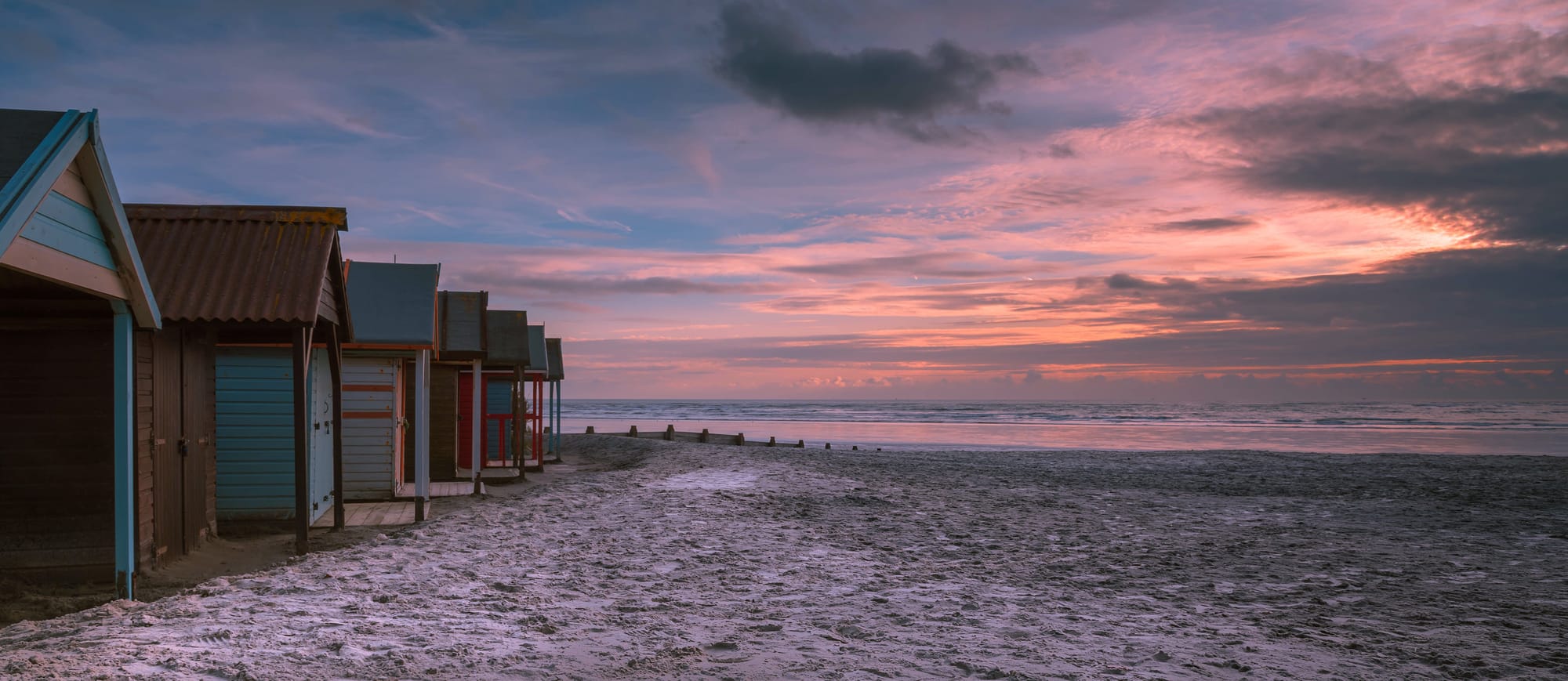 Beach hut sunset