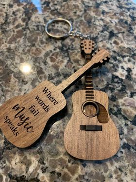 SAMPLE small keychain guitar