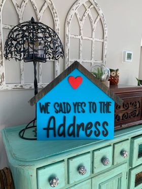 Large "We said yes to the address" sign