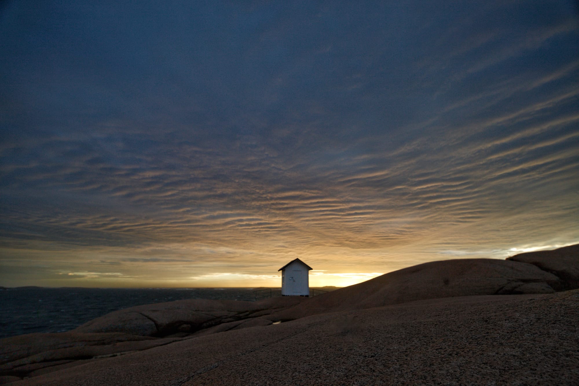 142. The setting Sun shines on the Clouds