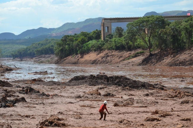 VALE DO RIO DOCE DA GOLPE E SO PAGA US$ 55,9 MILHOES PARA ENCERRAR O CASO