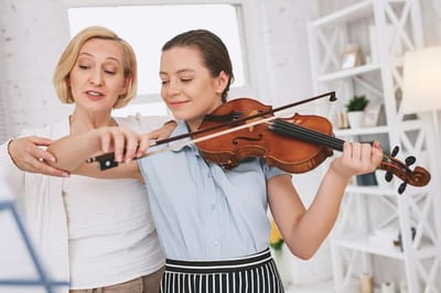 Why do basic violin lessons for beginners serve as the foundation?