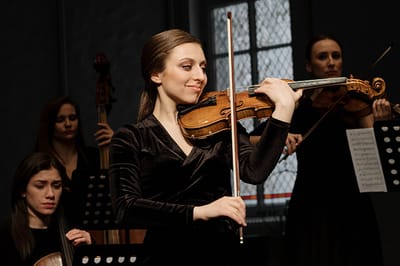 Why is a violin class beneficial for adults?