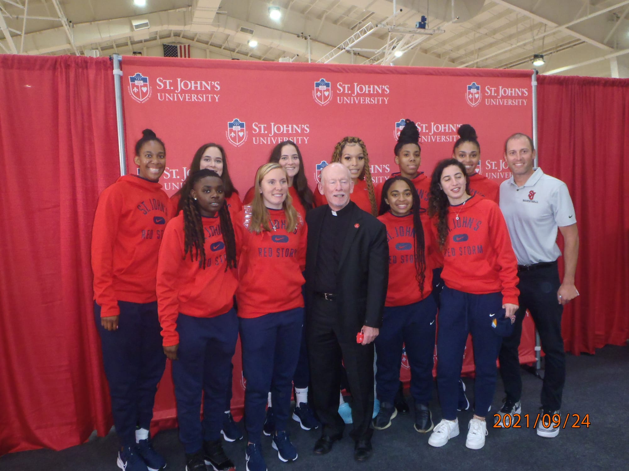 The new President with the women's basketball team