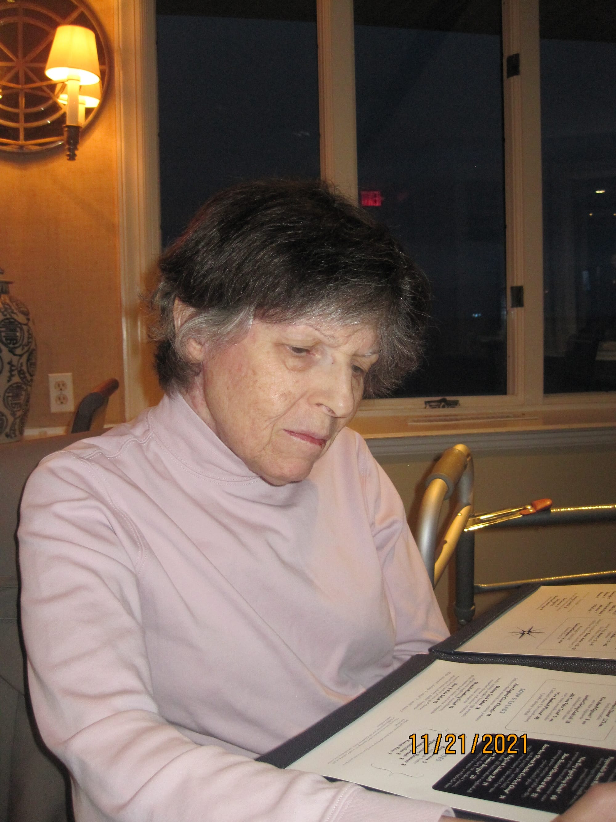 Ellen studying the menu at the View