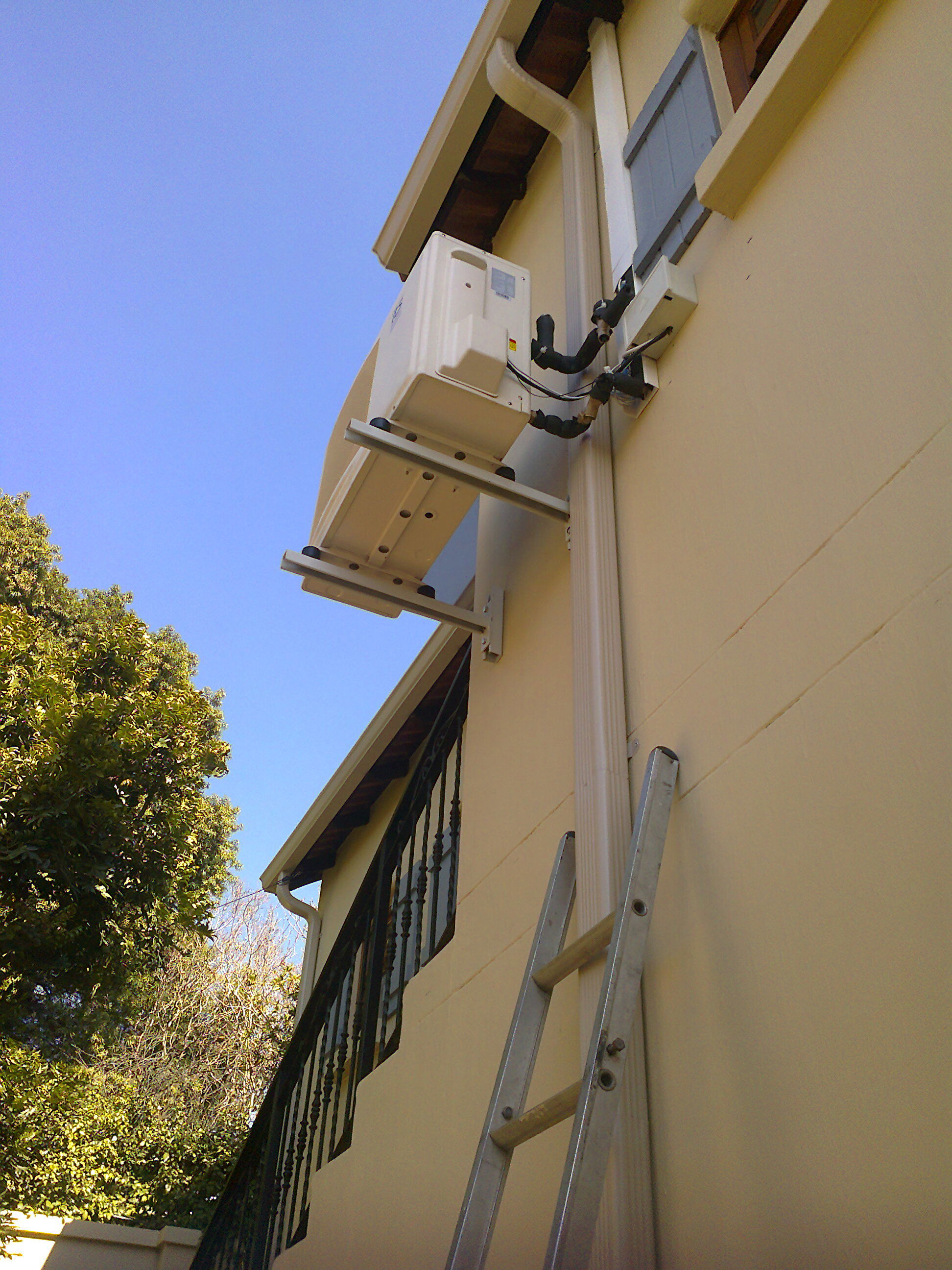 Heat Pump close to Geyser and Water Outlet