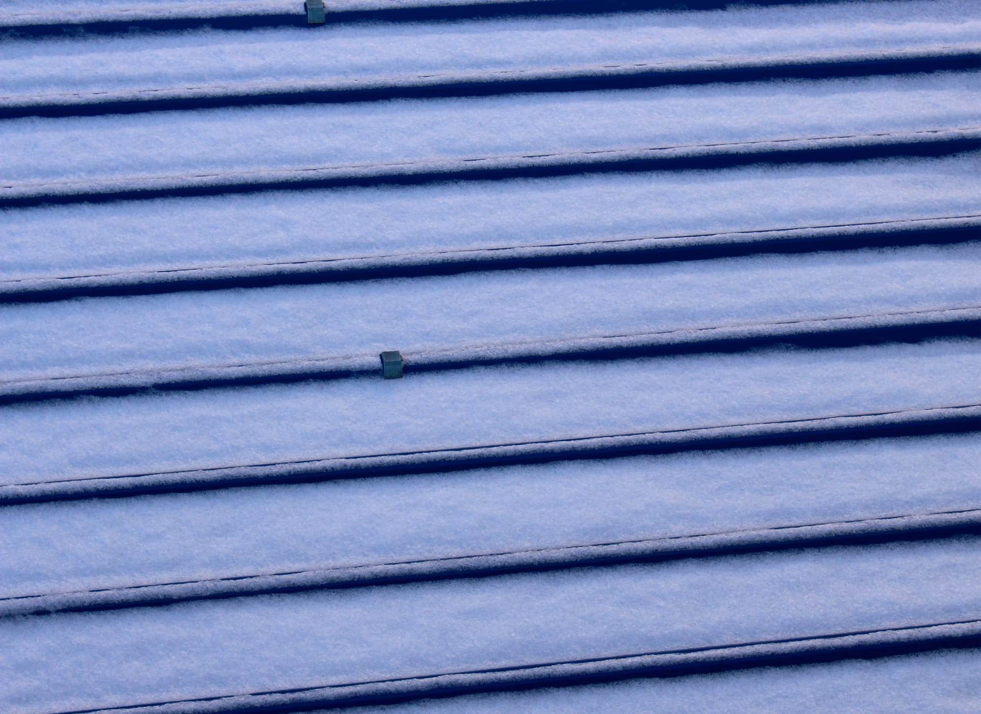 snow piled up on the roof