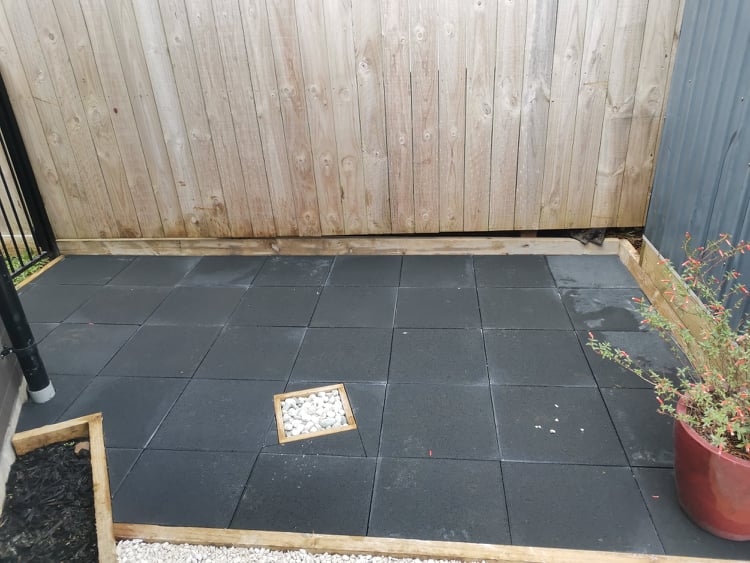 Paved Outdoor Area With Featured Pit Access