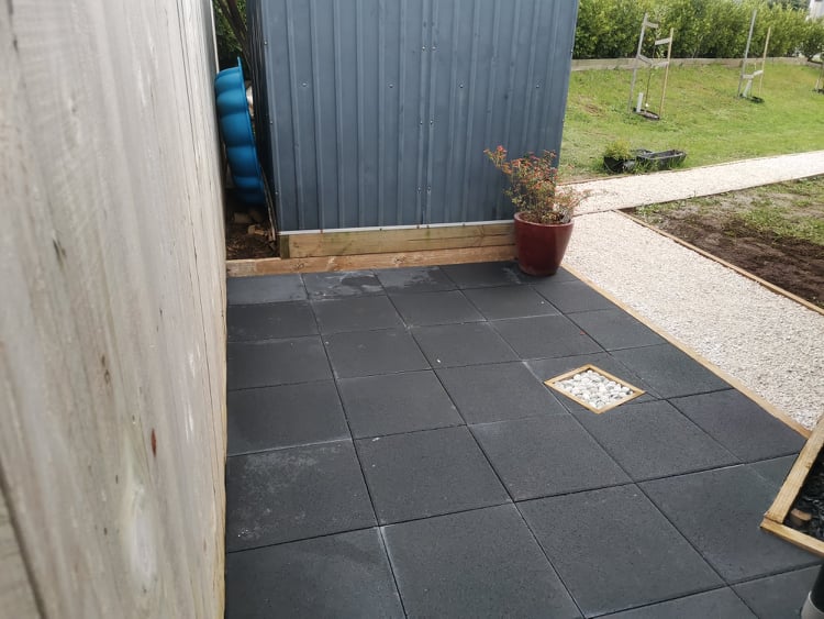 Paved Outdoor Area With Featured Pit Access