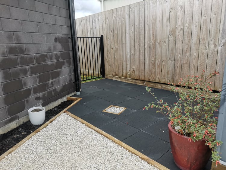 Paved Outdoor Area With Featured Pit Access