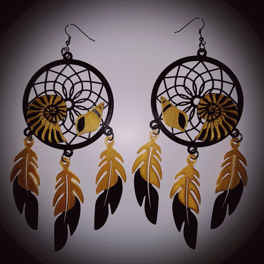 Boucles d'oreilles attrape rêve coquillages.