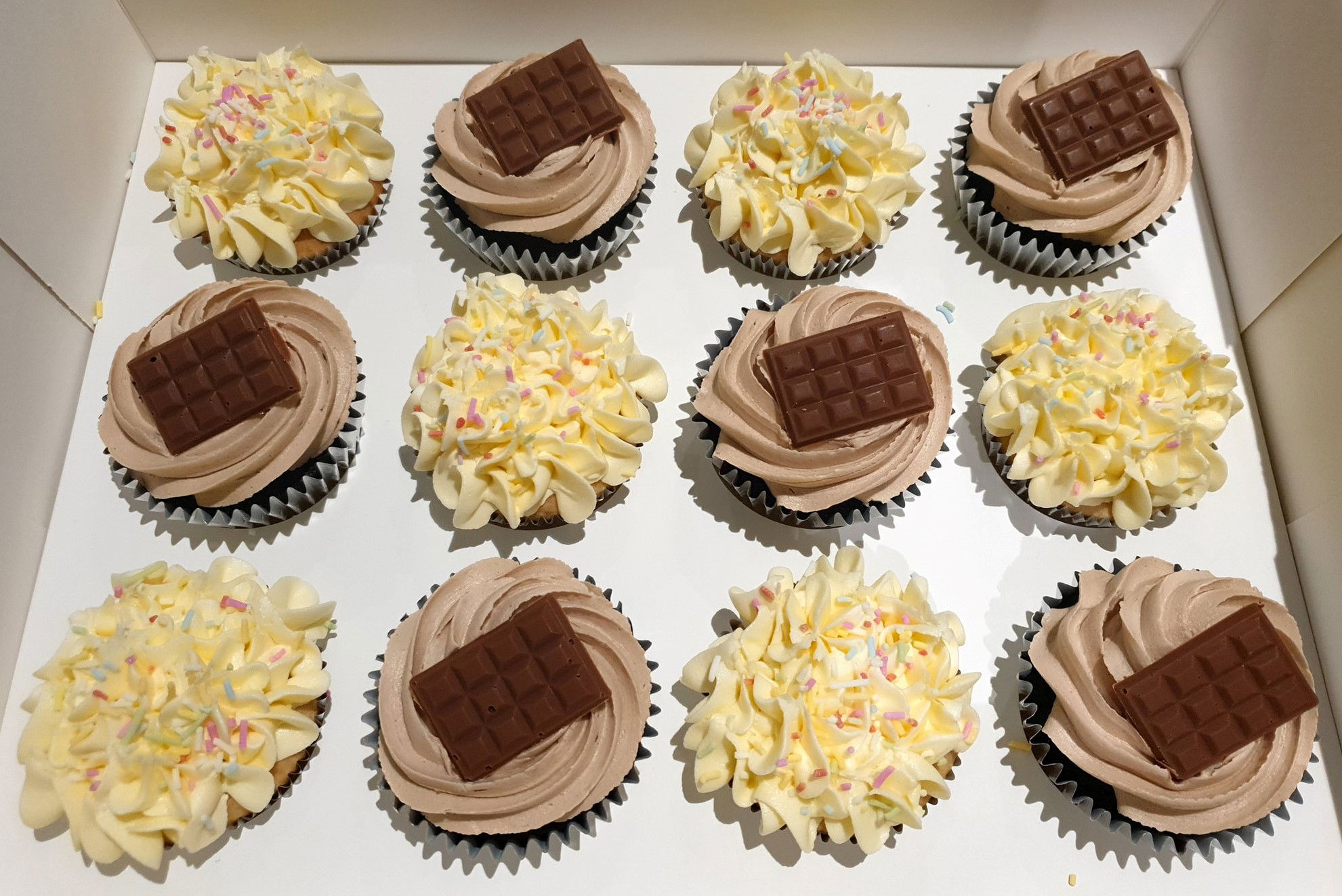 Vanilla And Chocolate Cupcakes With Buttercream Frosting