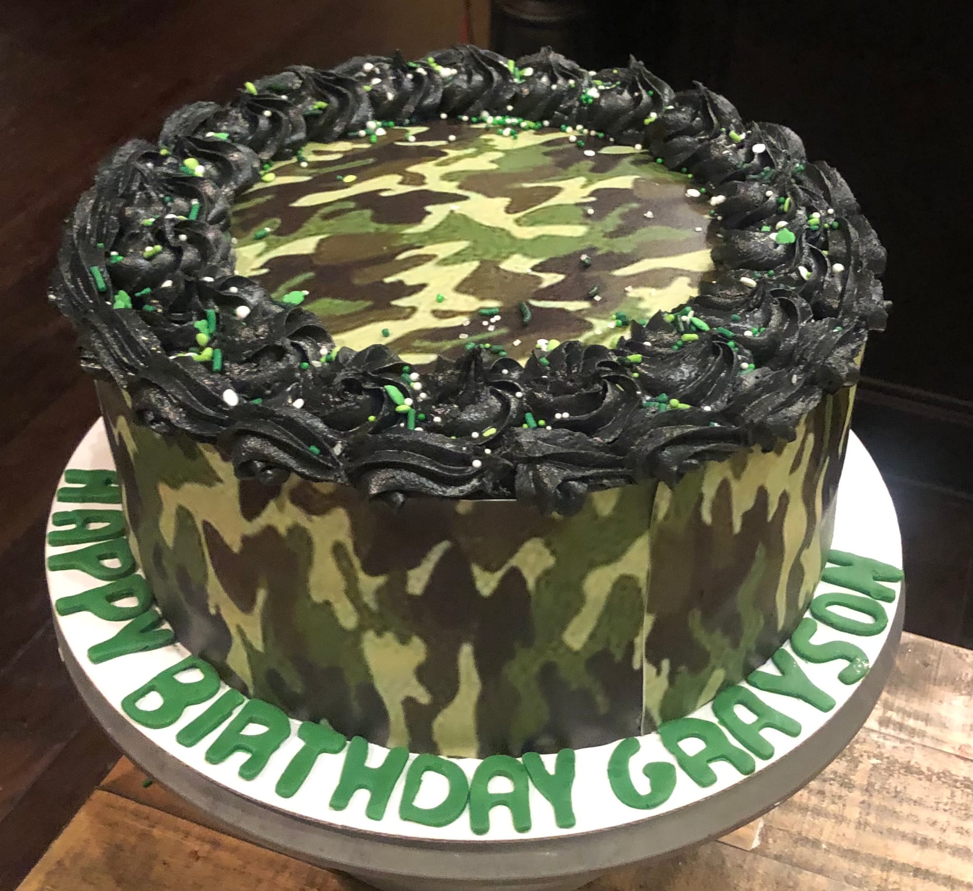 3 Layer Chocolate, Marble, and Strawberry Camo Cake With Black Vanilla Buttercream Frosting