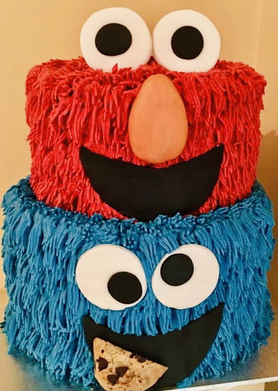2 Tier Chocolate and Vanilla Sesame Street Cake With Buttercream Frosting