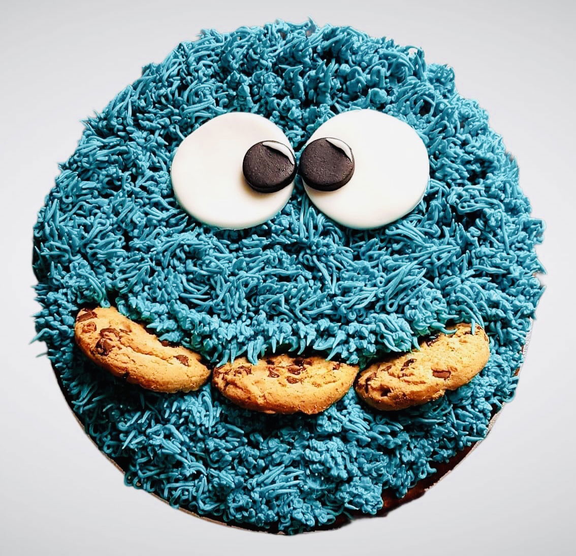 Chocolate Chip Cookie Monster Cookie Cake With Buttercream Frosting