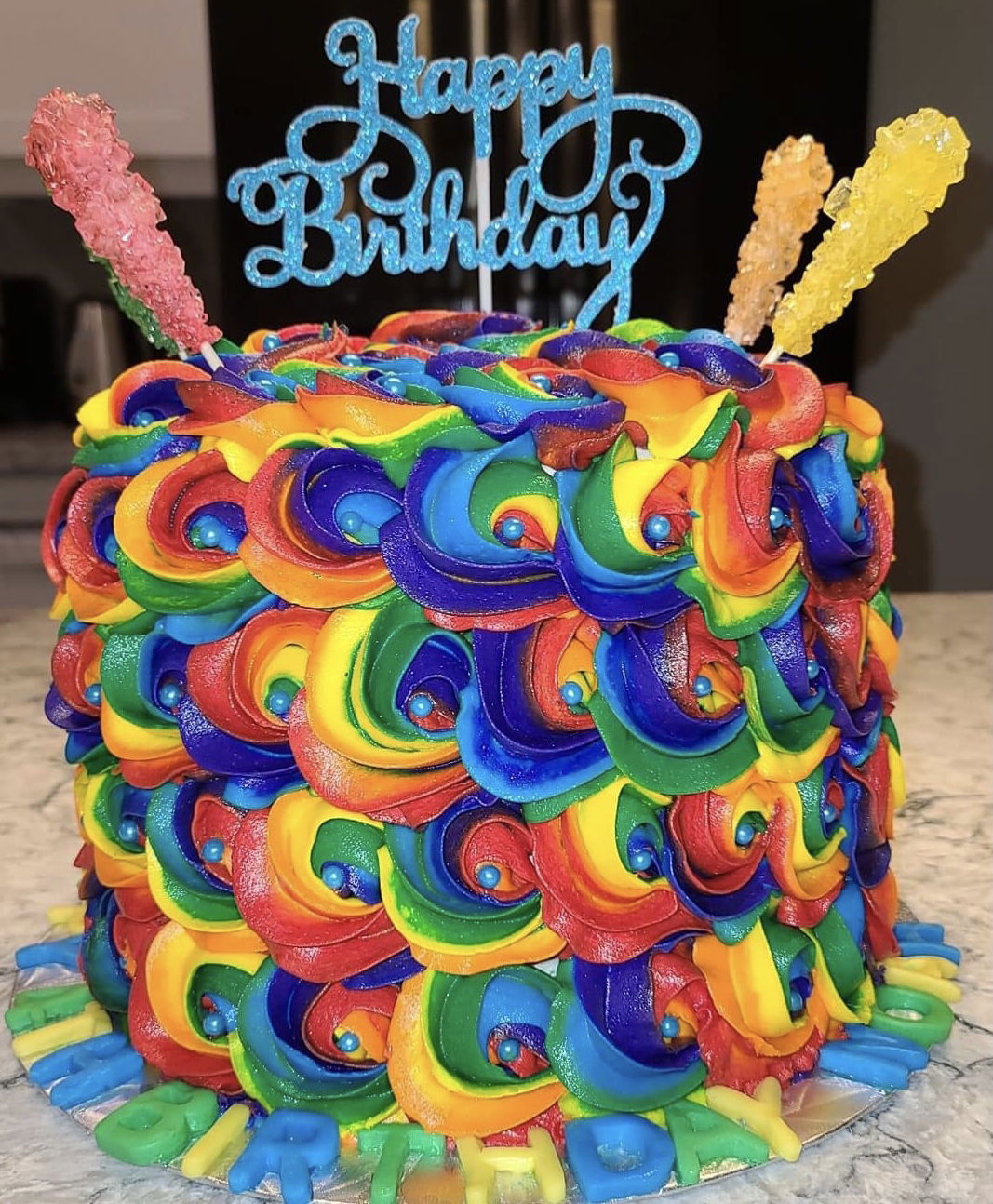 4 Layer Marble Rainbow Cake With Buttercream Frosting and Rock Candy