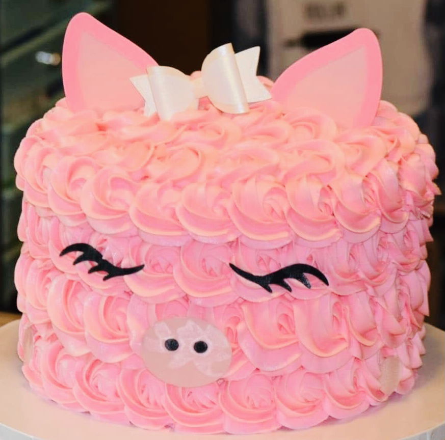 2 Layer Vanilla Pig With Bow Cake With Buttercream Frosting