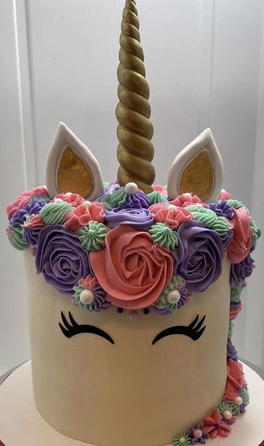 4 Layer Vanilla, Chocolate, Funfetti, and Strawberry Unicorn Cake With Buttercream Frosting