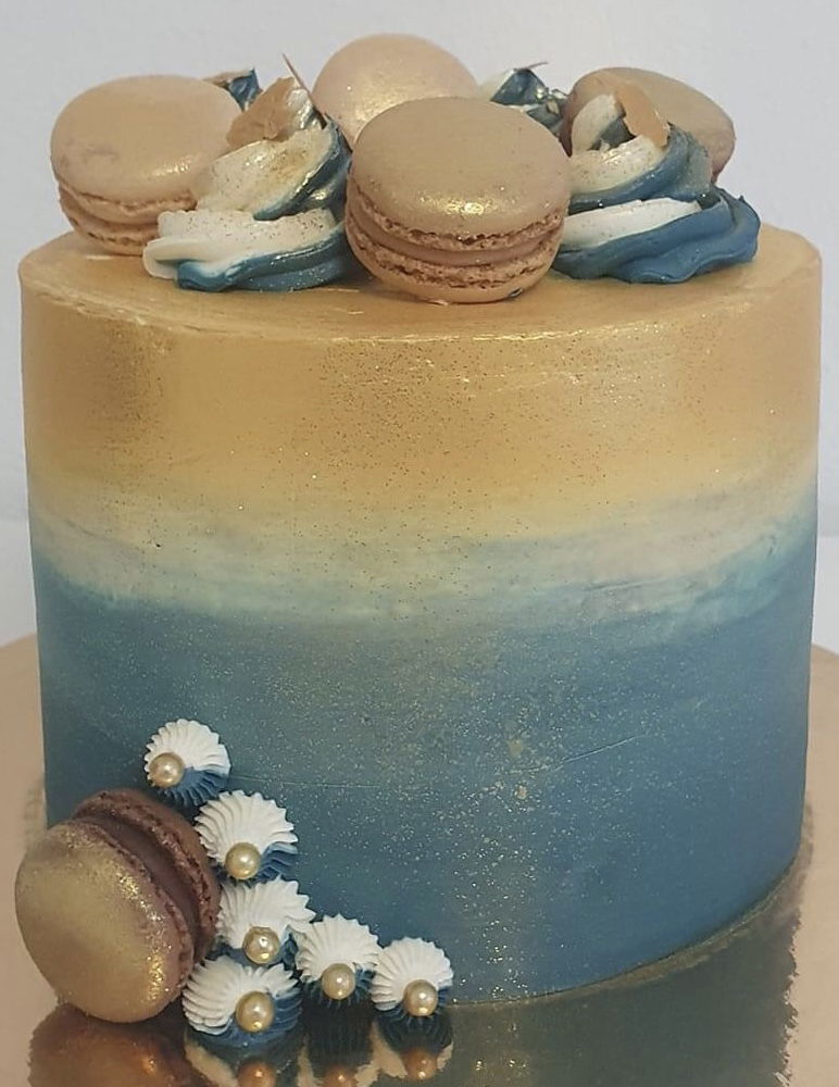 4 Layer Chocolate and Vanilla Cake With Buttercream Frosting and Macarons