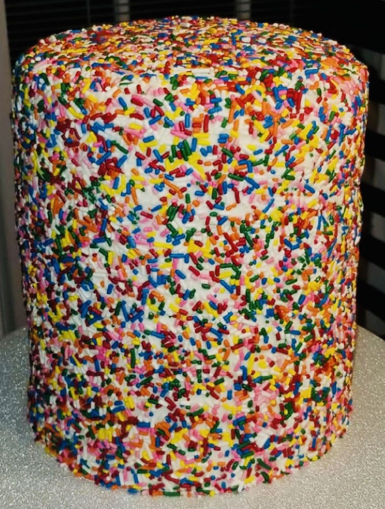 5 Layer Rainbow Sprinkle Vanilla Birthday Cake With Rainbow Color’s Inside