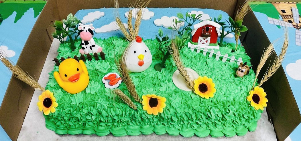 Vanilla and Strawberry Farm Animal Sheet Cake with Buttercream Frosting