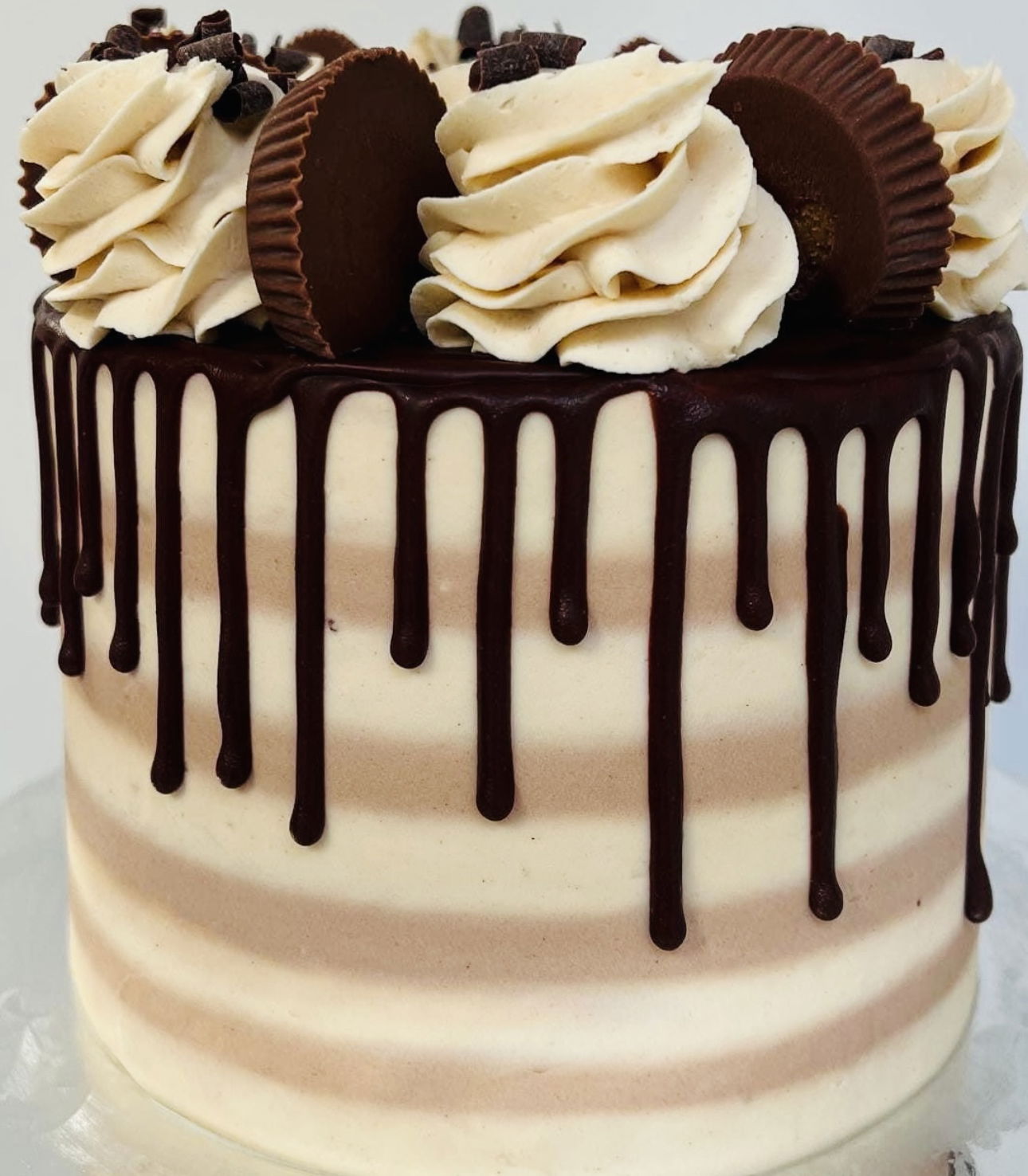3 Layer Reese’s Peanut Butter Cup Cake with Peanut Butter Frosting, and Reese’s Peanut Butter Cups