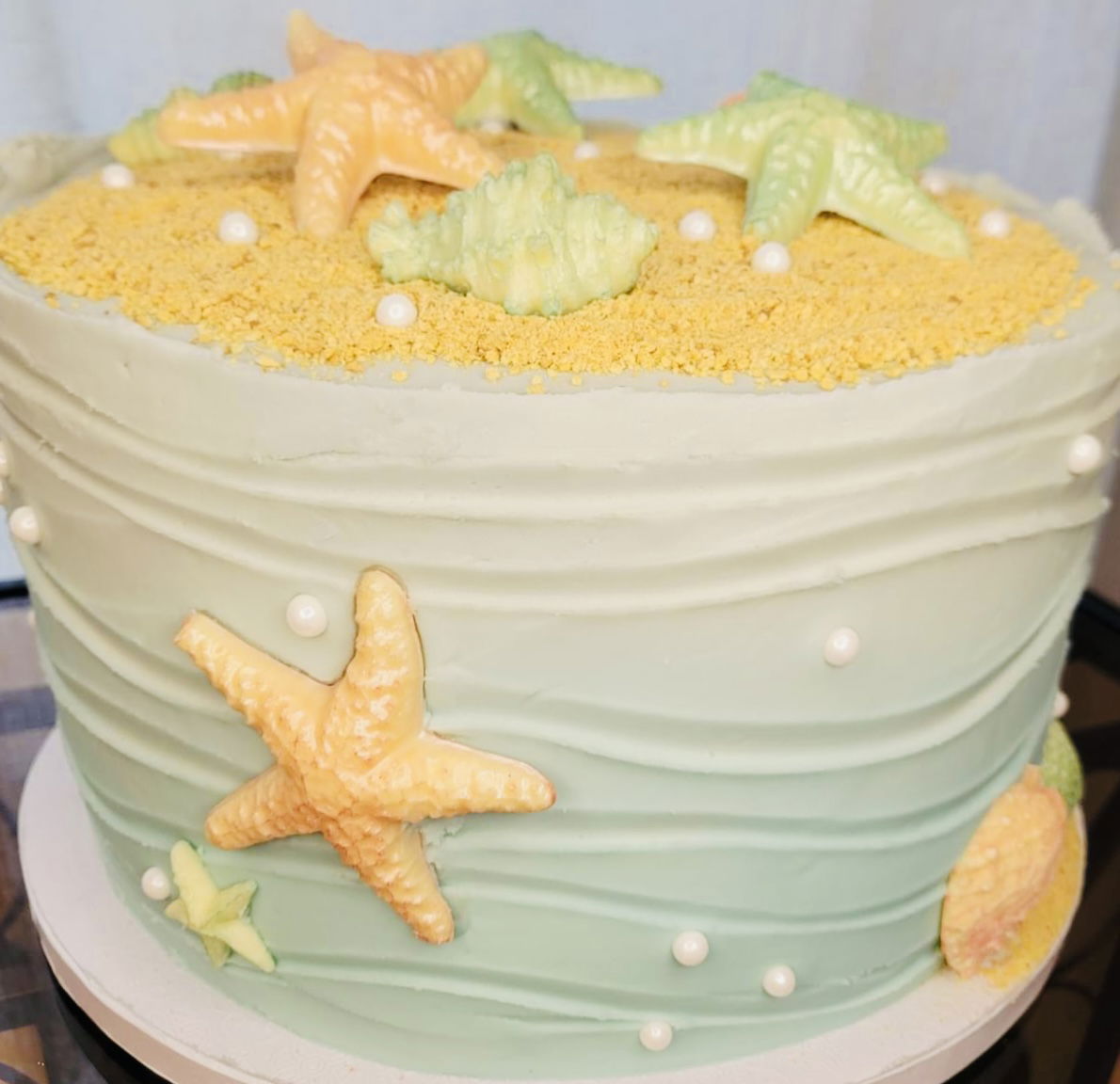 2 Layer Vanilla Sea Shell Beach Cake with Buttercream Frosting and Chocolate Appliqué
