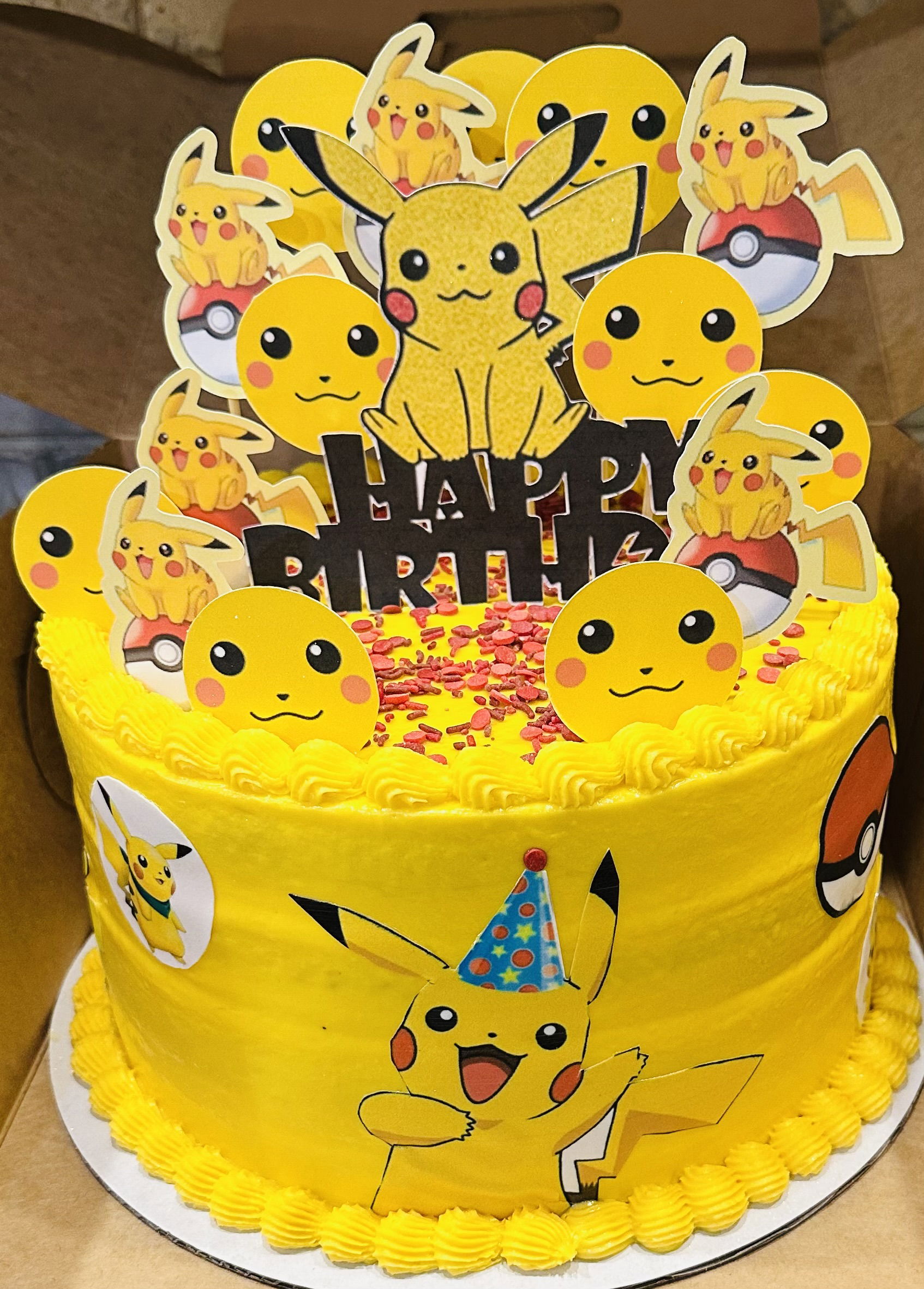 4 Layer Vanilla Pokémon Pikachu Cake with Buttercream Frosting and Edible Images