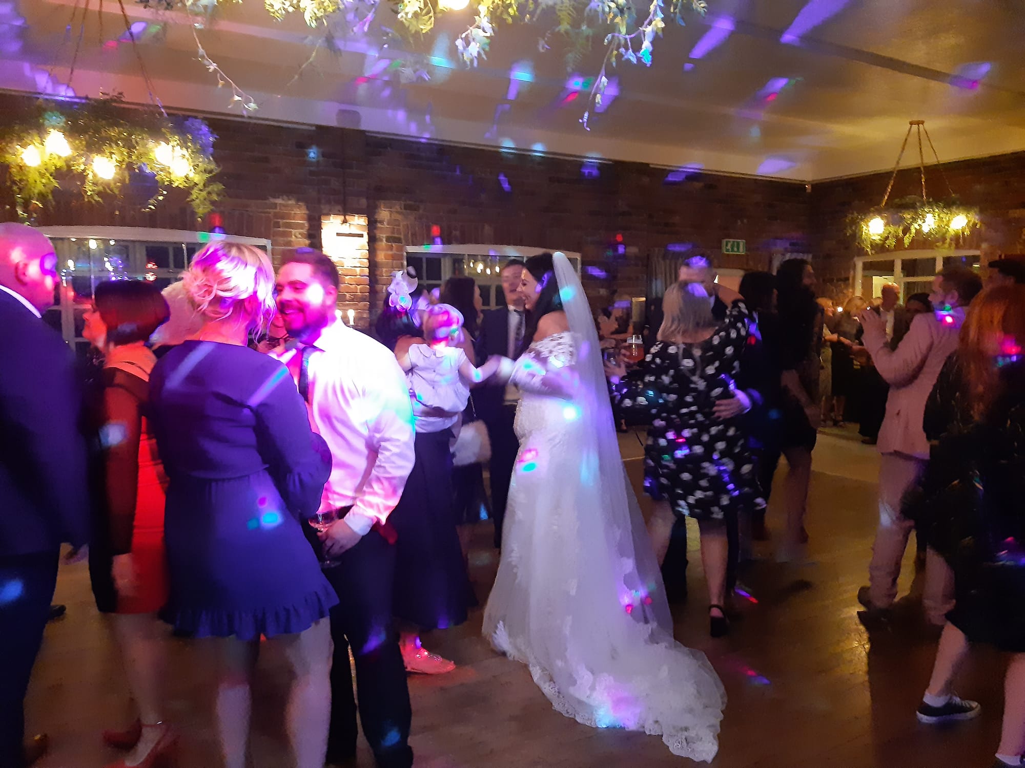 Smiles all round as the bride takes to the dancefloor!