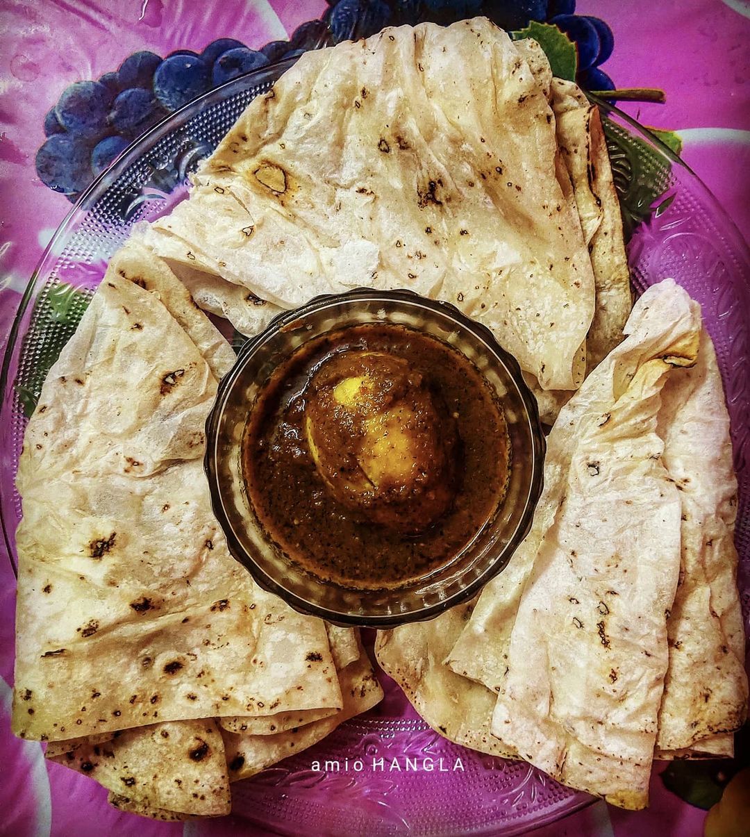 EGG MASALA and RUMALI ROTI.