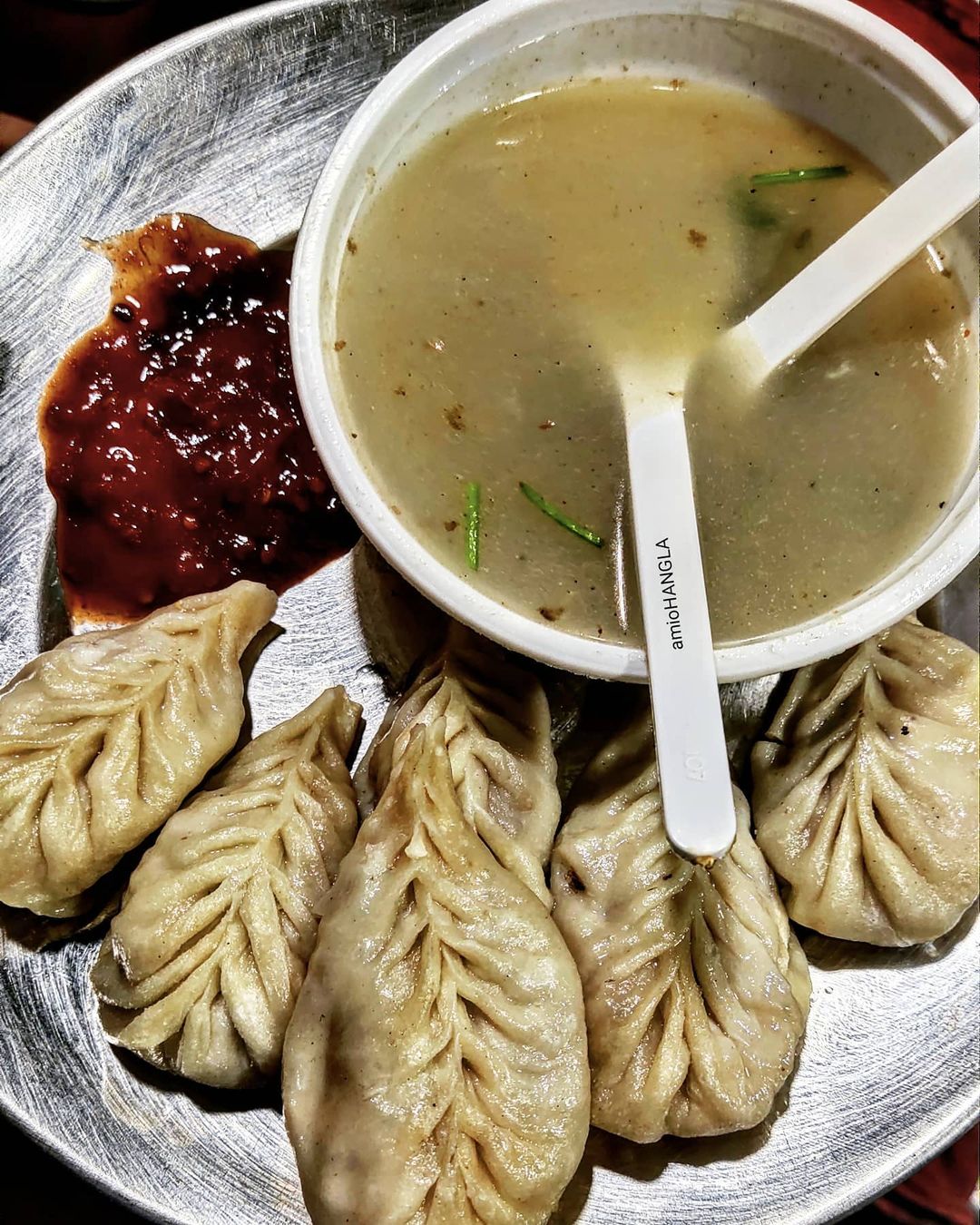 CHICKEN STEAMED MOMOES.