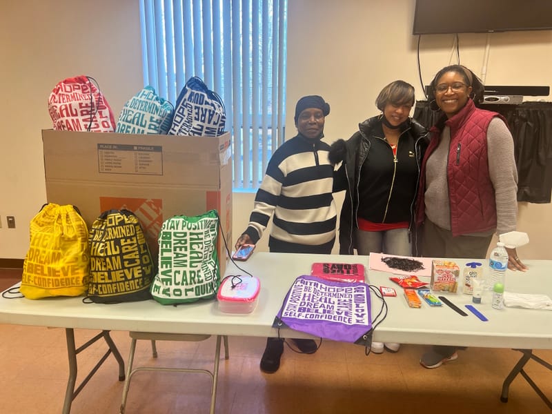 Shean and Marcus deliver donations to The Mount Olive Baptist Church.
