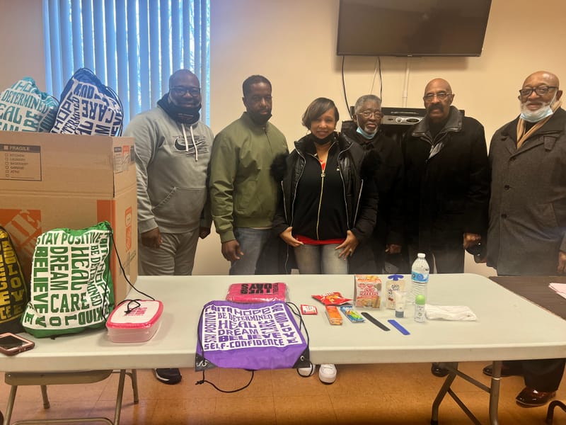 Shean and Marcus deliver donations to The Mount Olive Baptist Church.