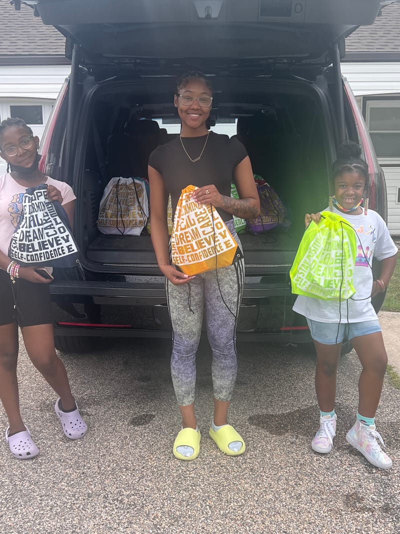 Dasia and Auntie Shean's Daycare Kids donate books and toys to Ronald McDonald House on 7/29/22.