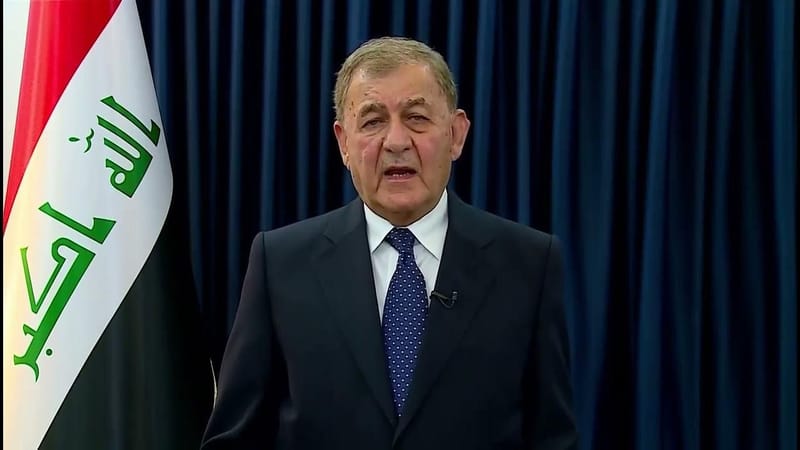 الرئيس رشيد يدعو إلى توفير الدعم والتسليح للحشد الشعبي