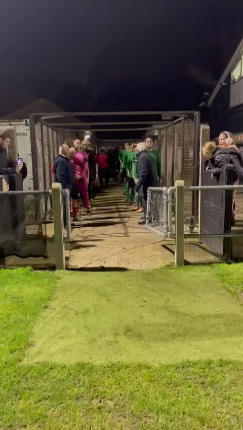 Team walking out the tunnel